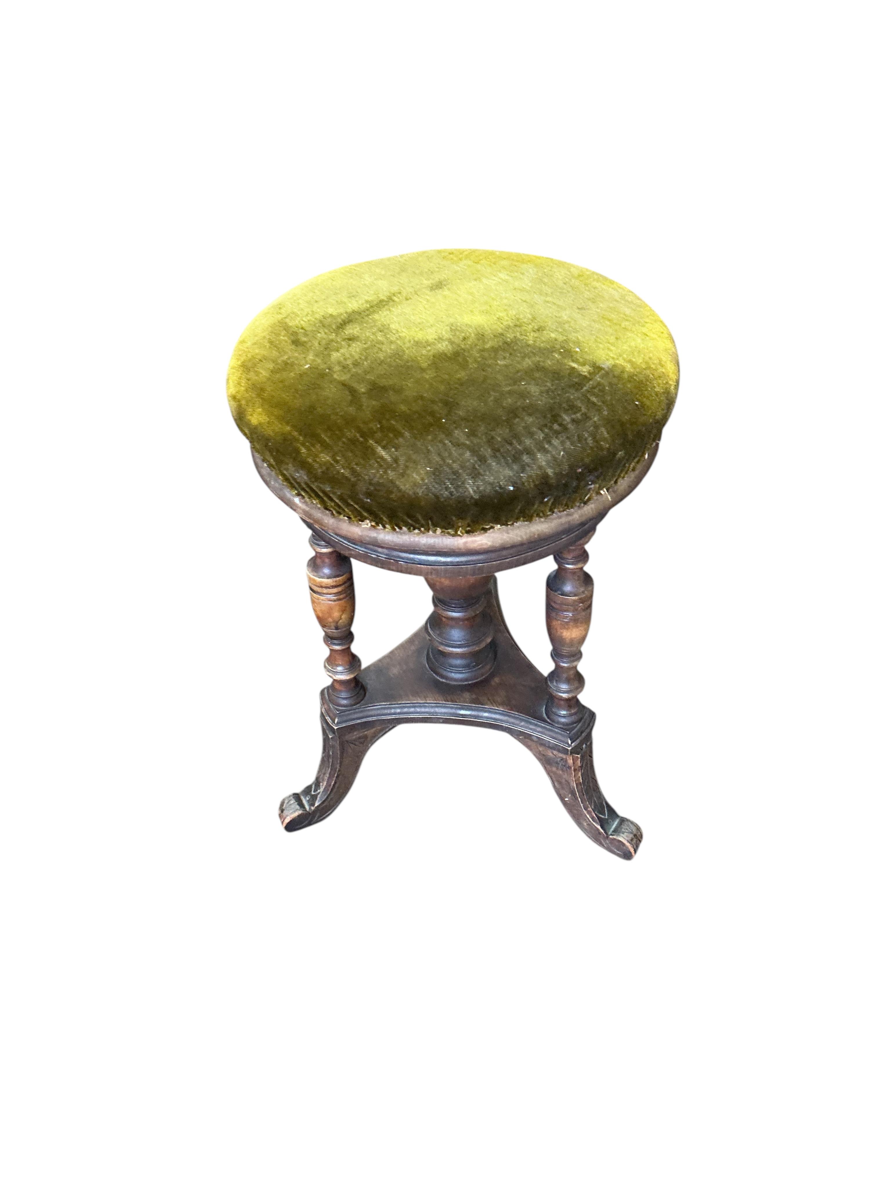 A late Victorian carved oak square two tier table, 59cm, height 66cm, together with a Victorian piano stool, a wall bracket and a Balinese wall mirror